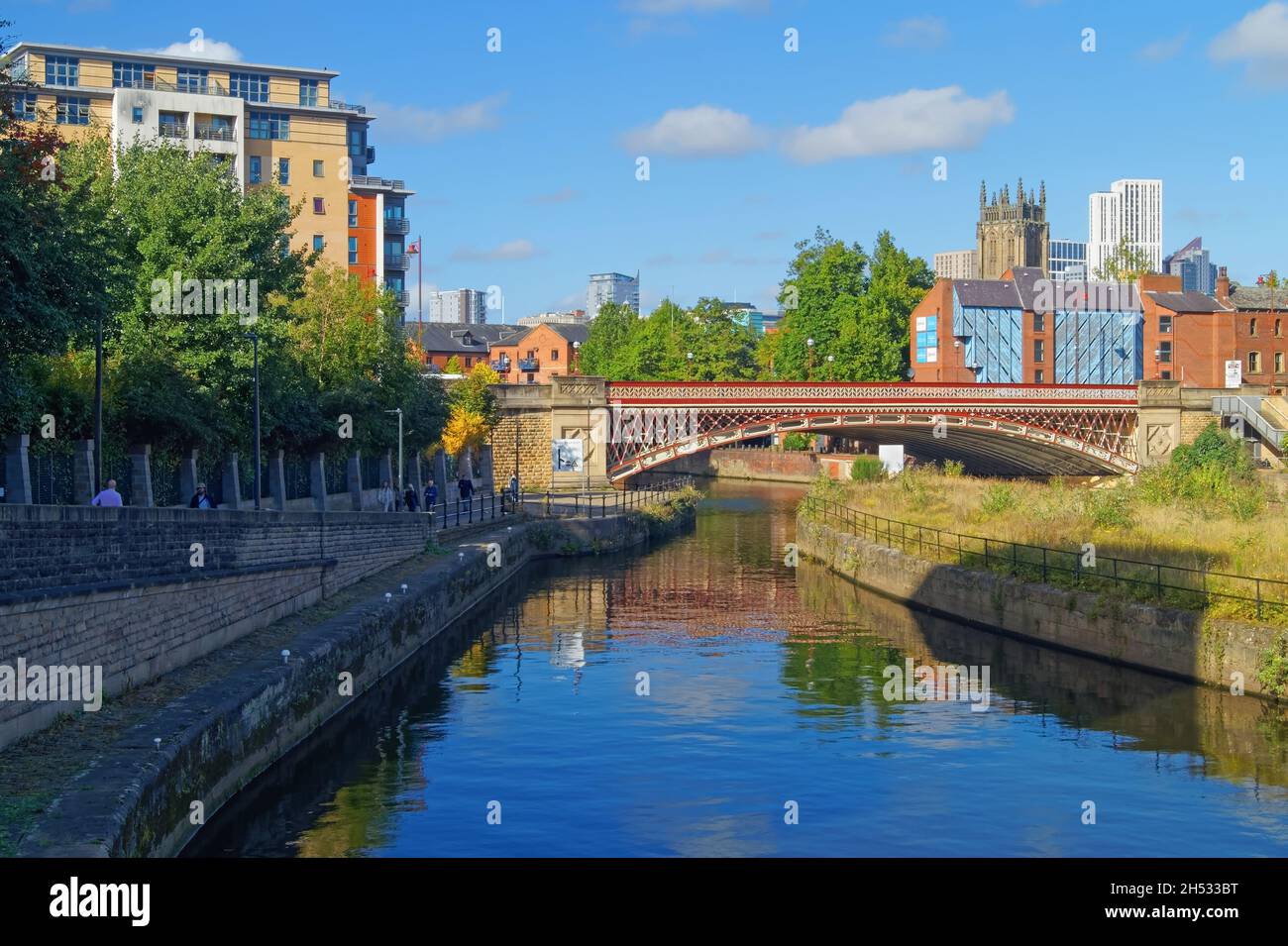 UK, West Yorkshire, Leeds, Crown Point Bridge over the River Aire, with Apartments, Leeds Minster and Altus Building dominating the skyline. Stock Photo