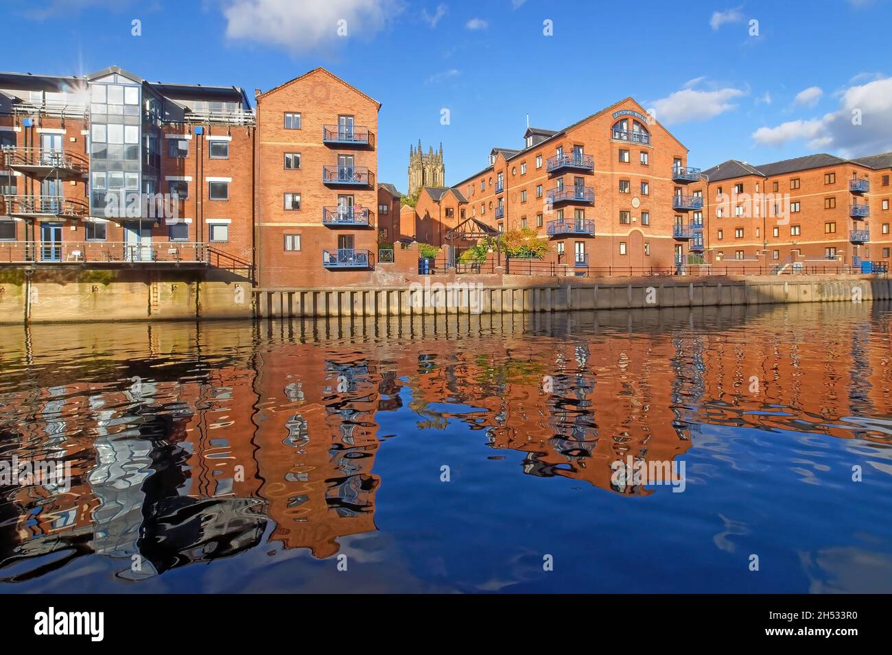 UK, West Yorkshire, Leeds, South Face of Leeds Minster and Riverside Apartments on The Calls Stock Photo