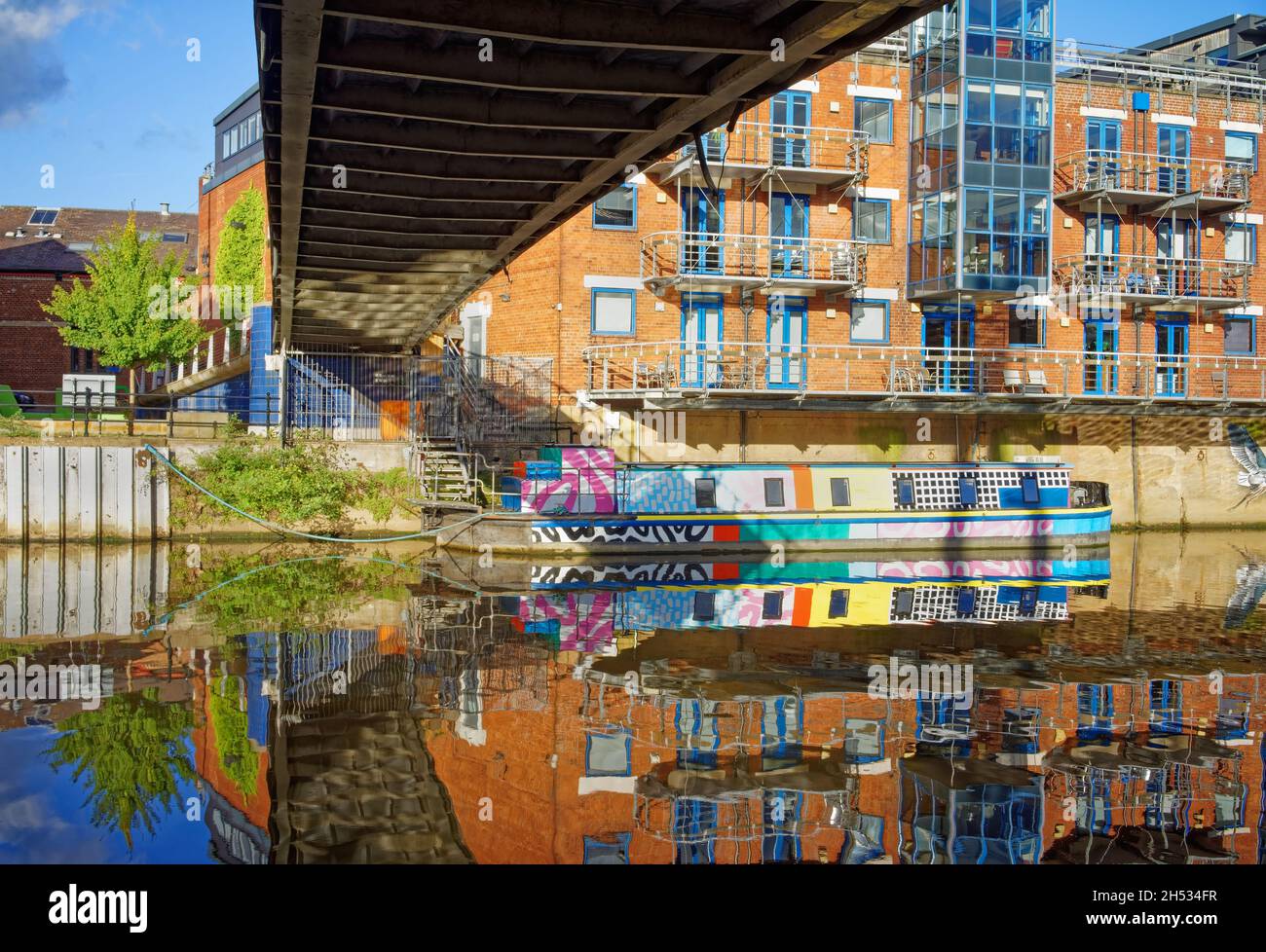 UK, West Yorkshire, Leeds, Under Centenary Bridge with Riverside Apartments on The Calls Stock Photo