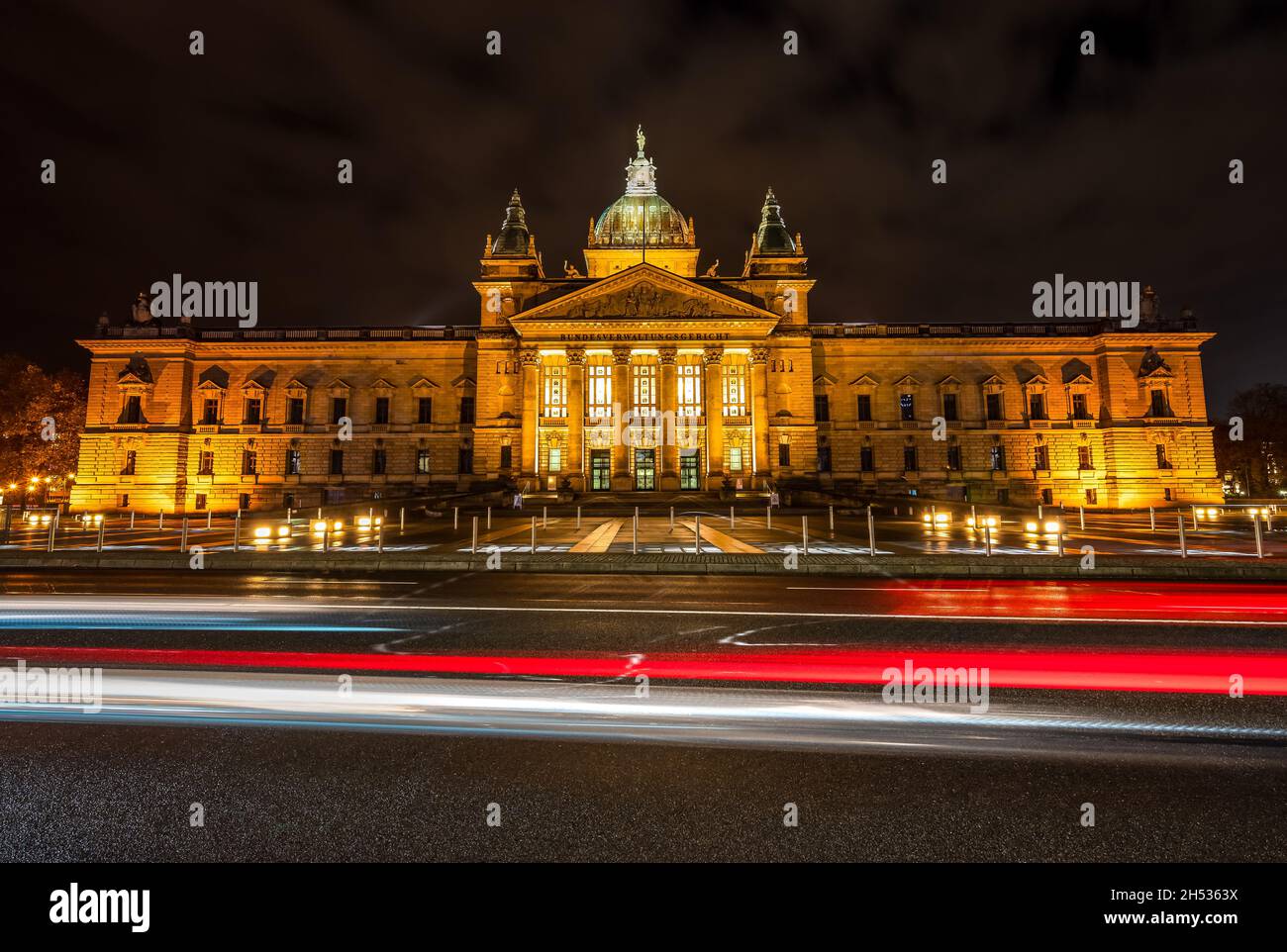 The illuminated historic building of the Federal Administrative Court (built between 1888 and 1895) in Leipzig (Germany). Stock Photo