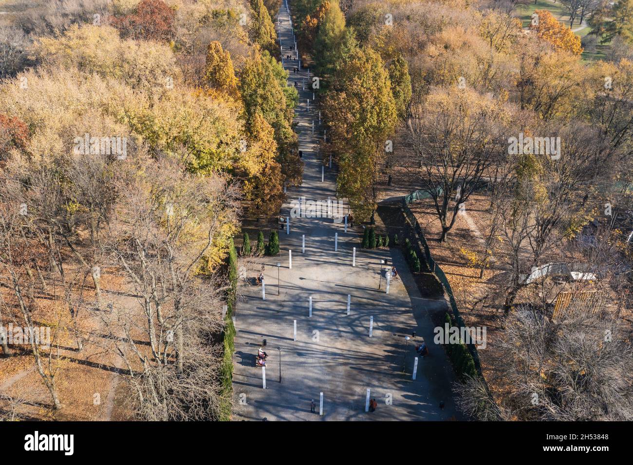 Alley in Warsaw Insurgents Park next to Warsaw Insurgents cemetery and Wolski Cemetery in Warsaw, Poland Stock Photo