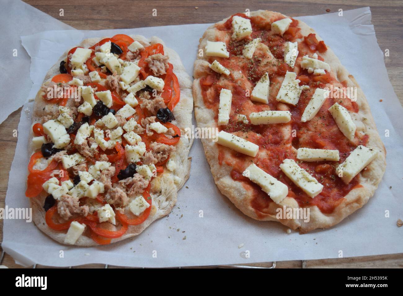 homemade pizza with tuna onion and black olives Stock Photo Alamy
