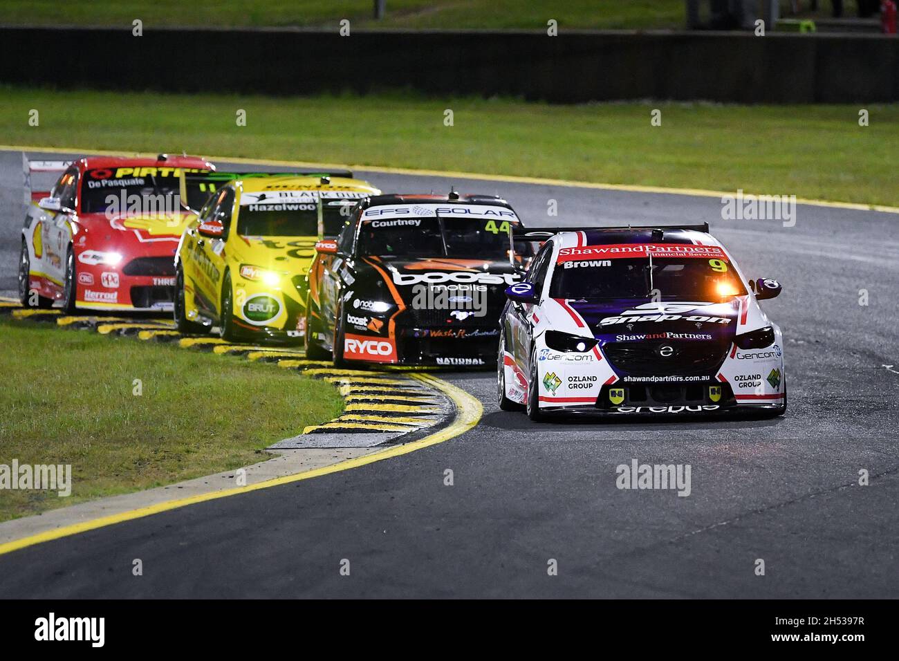 Sydney, Australia, 6 November, 2021. Will Brown in the Erebus Motorsport Holden Commodore in front of James Courtney in the Boost Mobile Racing Ford Mustang during the V8 Supercars Sydney SuperNight at Sydney Motorsport Park, on November 06, 2021 in Sydney, Australia. Credit: Steven Markham/Speed Media/Alamy Live News Stock Photo