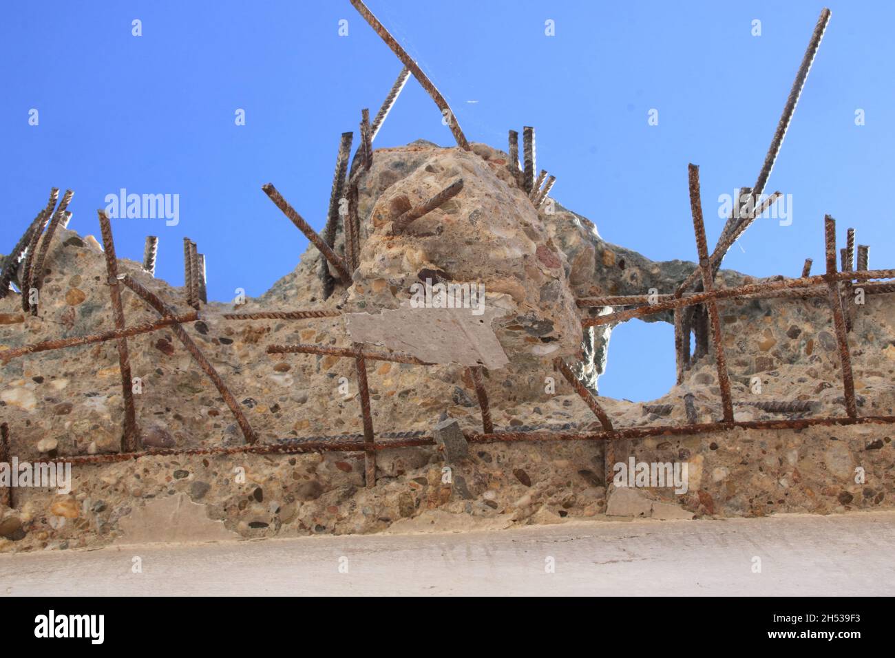 Demolition edge on a roof with steel and concrete Stock Photo
