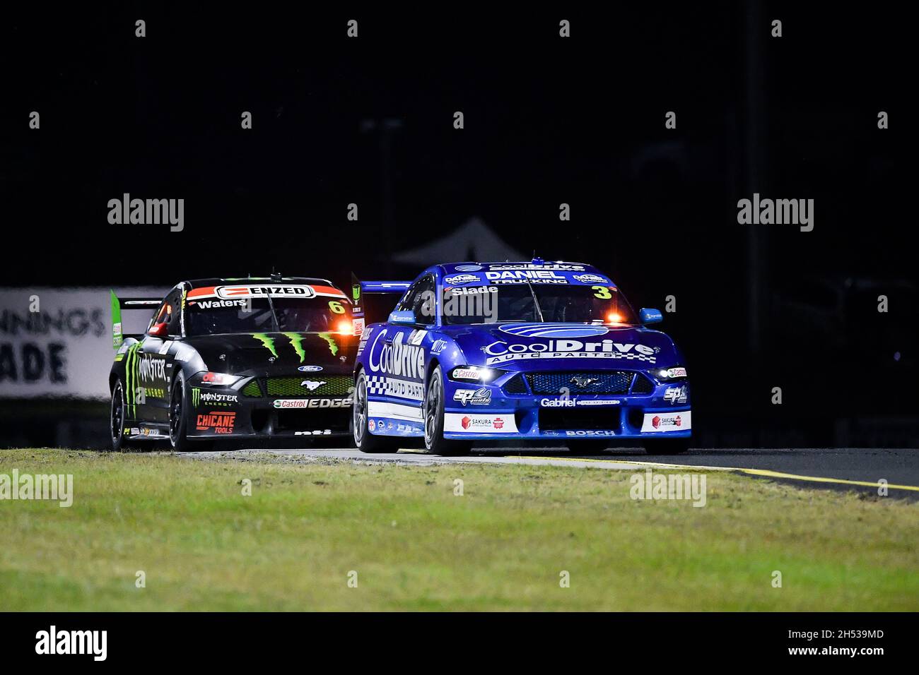 Sydney, Australia, 6 November, 2021. Tim Slade in the Blanchard Racing Team Ford Mustang ahead of Cameron Waters in the Monster Energy Racing Ford Mustang during the V8 Supercars Sydney SuperNight at Sydney Motorsport Park, on November 06, 2021 in Sydney, Australia. Credit: Steven Markham/Speed Media/Alamy Live News Stock Photo
