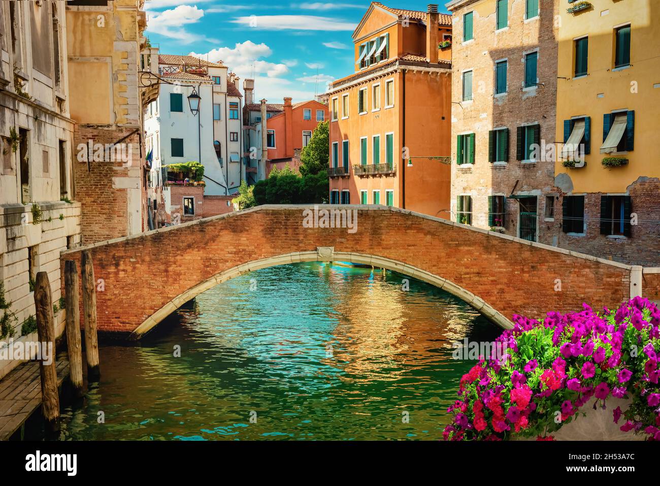 Canal and bridge in Venice at sunset Stock Photo - Alamy