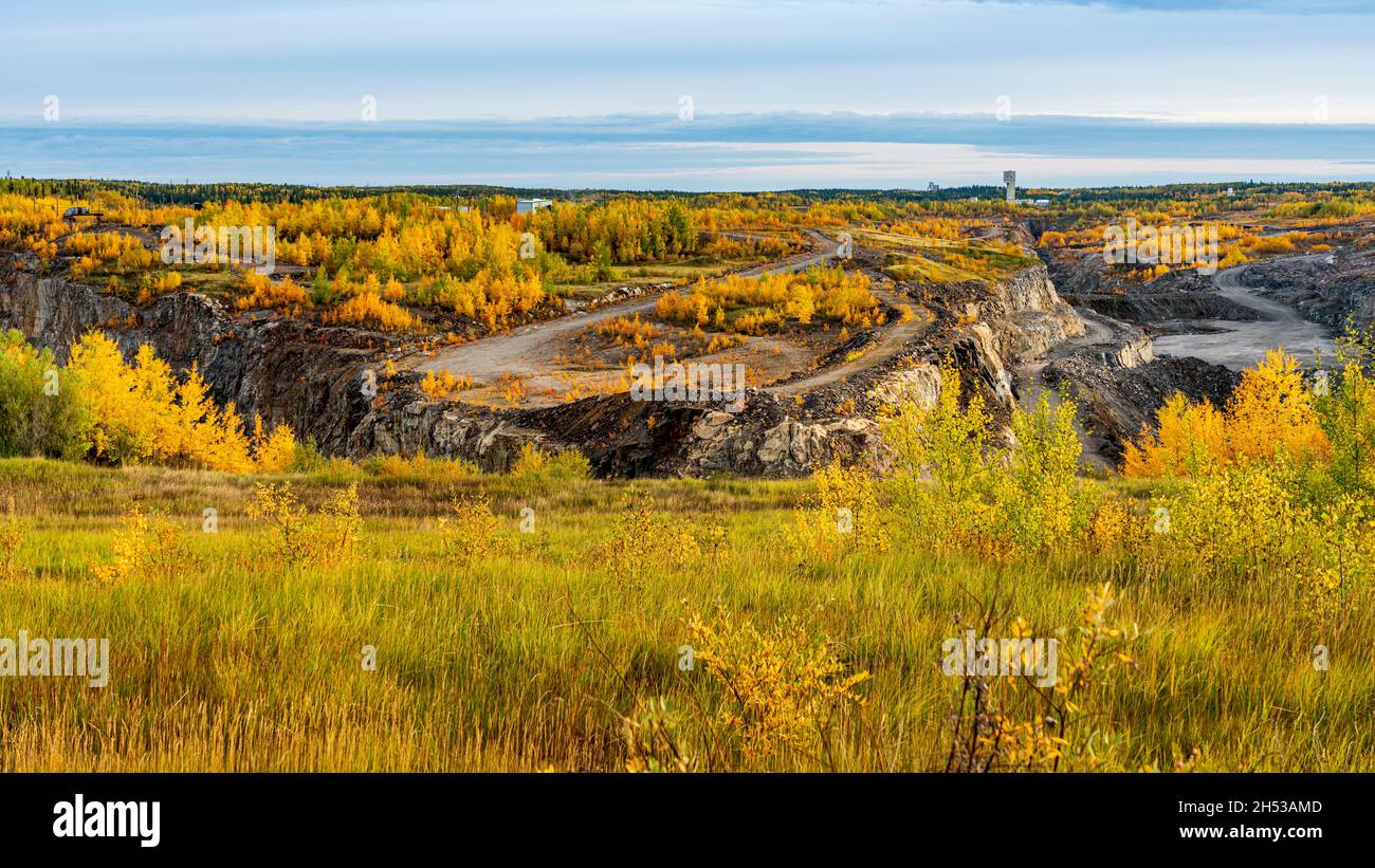 The Vale Canada nickel open pit mine site with fall foliage color in