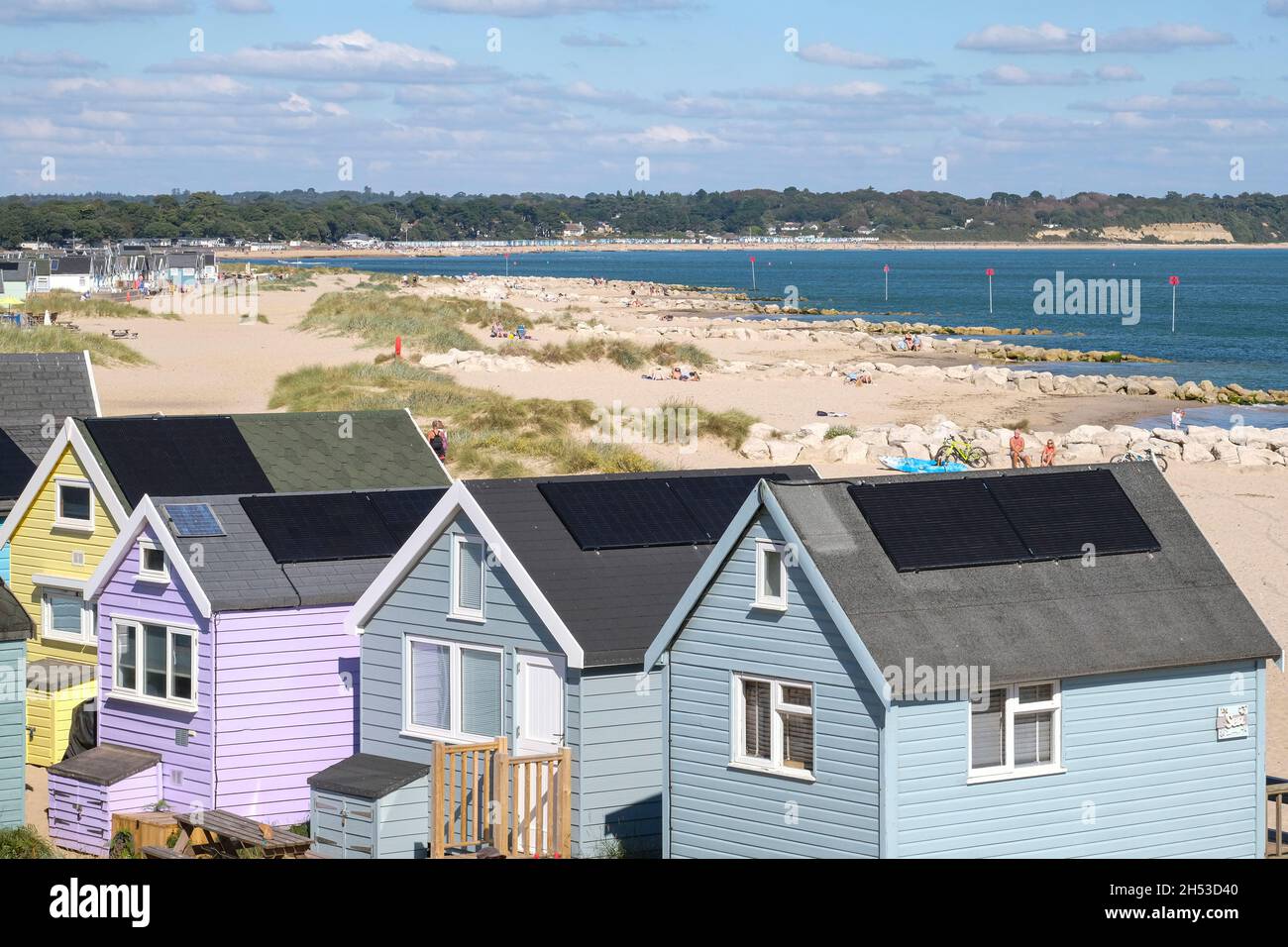 Mudeford Spit or Sandbank with beach huts, Christchurch Harbour, Dorset Stock Photo