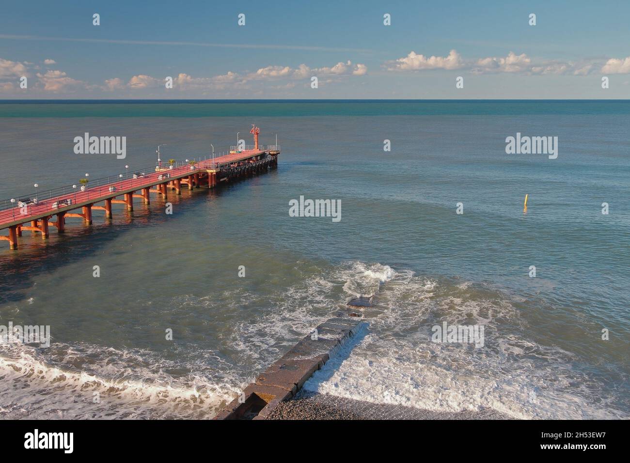 Pierce, breakwater and sea after last night's storm. Adler, Sochi, Russia Stock Photo