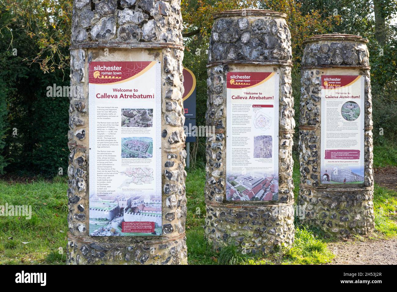 Visitor information on three vertical columns about the Silchester Roman City Walls (Calleva Atrebatum). Hampshire, UK Stock Photo
