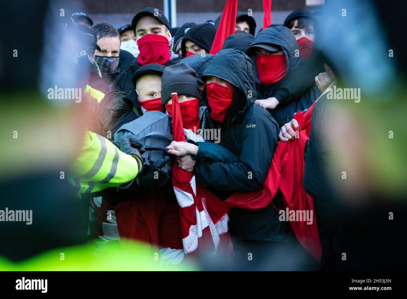 Glasgow, UK. 06th Nov, 2021. The Young Communist League get kettled by police during the Global Day of Action.ÊThe protest sees movements mobilising against the world leaders attending the COP26 Climate summit. Credit: Andy Barton/Alamy Live News Stock Photo