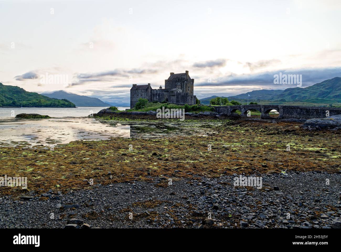 Eilean Donan Castle on Loch Duich at sunset, Dornie, Western Highlands, Scotland, United Kingdom. 19th of July 2021 Stock Photo