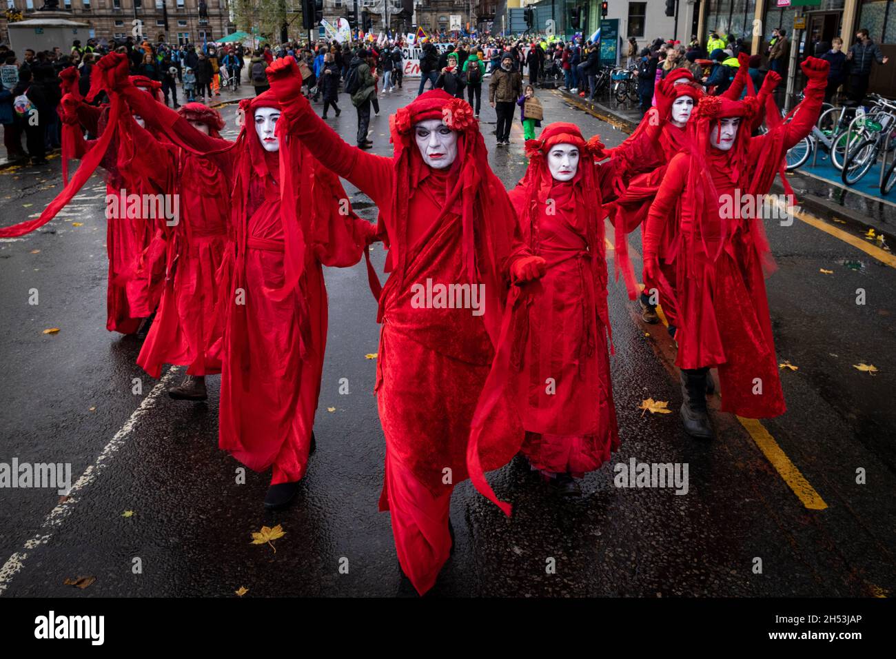 Glasgow, UK. 06th Nov, 2021. The Extinction Rebellion Red Army march through the city during the Global Day of Action.ÊThe protest sees movements mobilising against the world leaders attending the COP26 Climate summit. Credit: Andy Barton/Alamy Live News Stock Photo