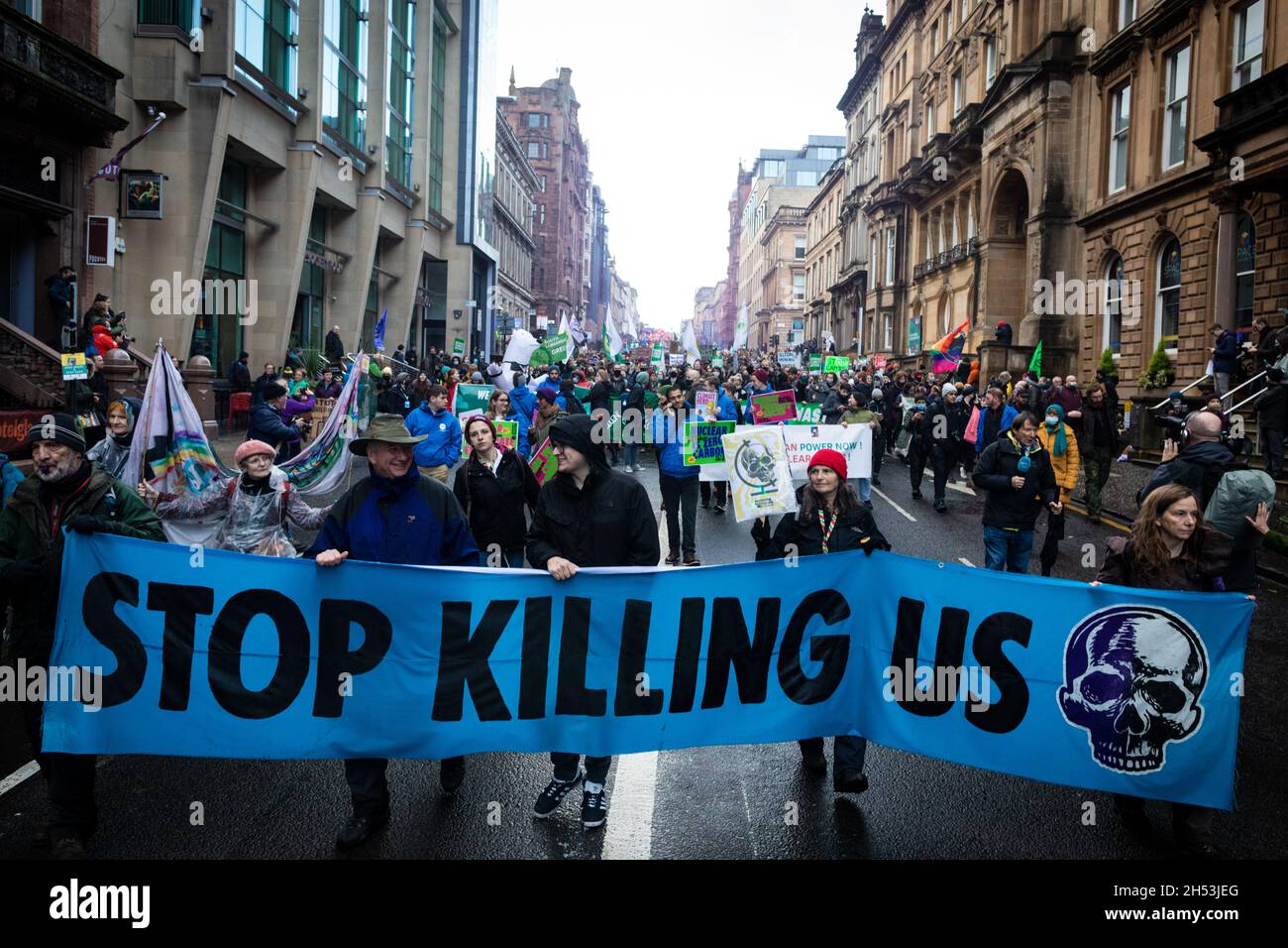 Glasgow, UK. 06th Nov, 2021. Protesters with a placards march through the city during the Global Day of Action.ÊThe protest sees movements mobilising against the world leaders attending the COP26 Climate summit. Credit: Andy Barton/Alamy Live News Stock Photo