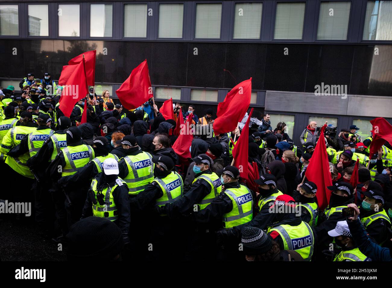 Glasgow, UK. 06th Nov, 2021. The Young Communist League get kettled by police during the Global Day of Action.ÊThe protest sees movements mobilising against the world leaders attending the COP26 Climate summit. Credit: Andy Barton/Alamy Live News Stock Photo