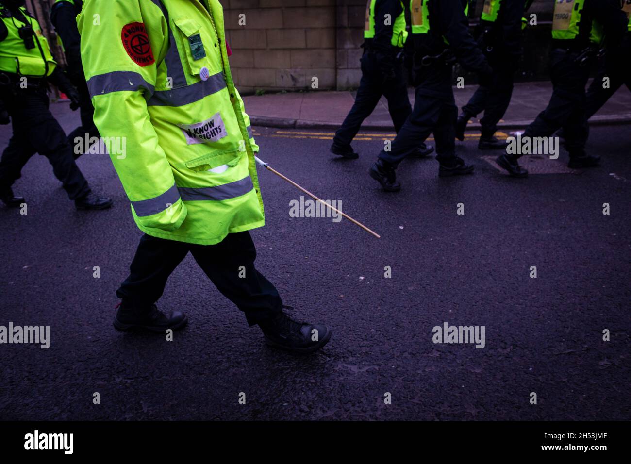 Glasgow, UK. 06th Nov, 2021. A protester with a placard marches through the city during the Global Day of Action.ÊThe protest sees movements mobilising against the world leaders attending the COP26 Climate summit. Credit: Andy Barton/Alamy Live News Stock Photo