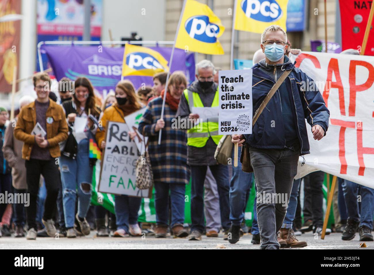 Bristol, UK, 6th November, 2021. Protesters carrying climate change placards and signs are pictured as they take part in a climate change protest march through the centre of Bristol. The protest was one of hundreds held around the world today as people took to the streets to push world leaders to act as their negotiators meet in Glasgow at the COP 2021 United Nations Climate Change Conference. Credit: Lynchpics/Alamy Live News Stock Photo