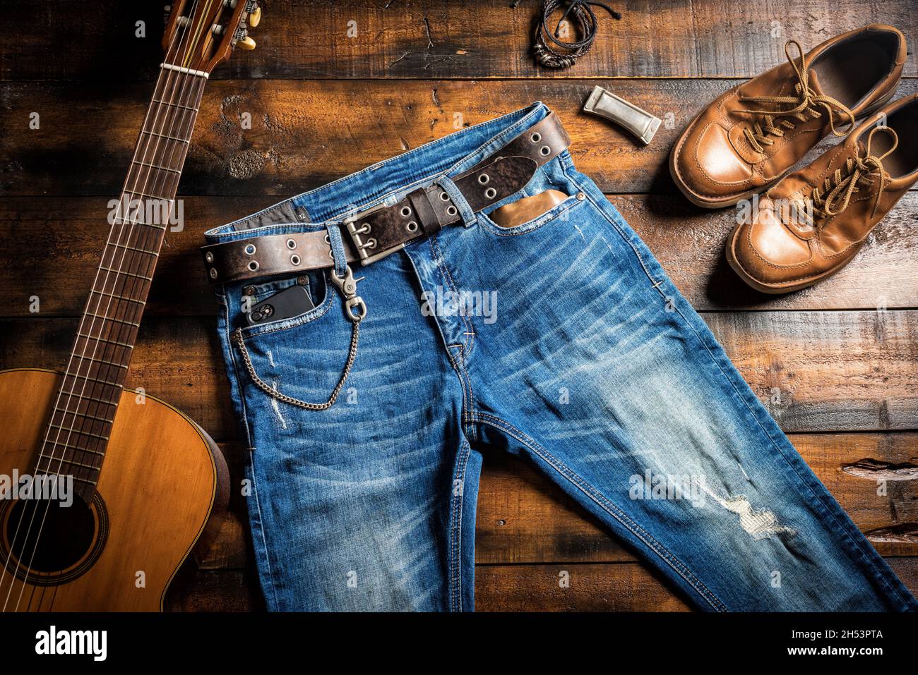 Blue jeans with rock style of brown genuine leather belt and other men accessories Stock Photo Alamy