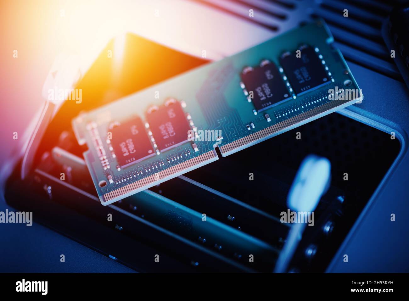 Upgrading the personal computer concept. Closeup the new memory module or random access memory (RAM). The DDR4 memory module with 260 pins. Stock Photo