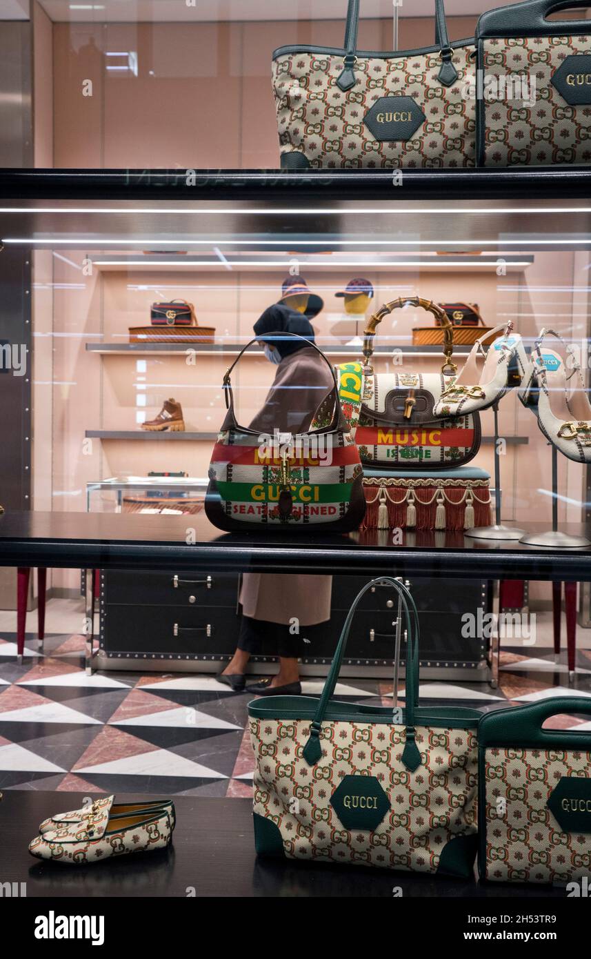 Woman shopping at luxury Gucci brand shop in Bond Street,London,England,UK  Stock Photo - Alamy