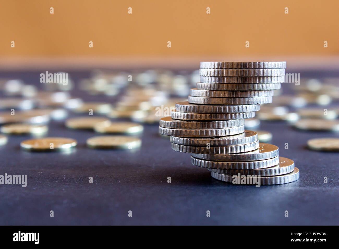 Turkish money coins, stack of Turkish lira coins on table. Business growth and risk concept. Stock Photo