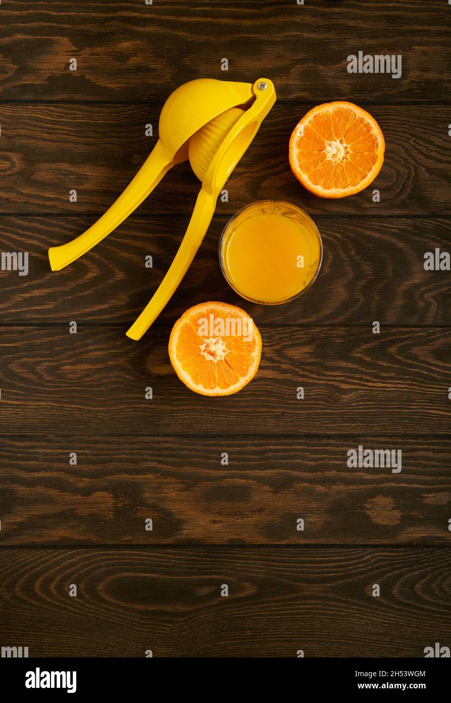 Glass of orange juice on flat table hires stock photography and images