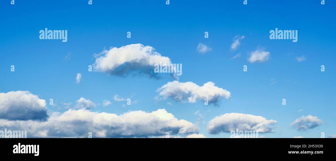 Blue sky background with tiny clouds. Panorama Stock Photo - Alamy