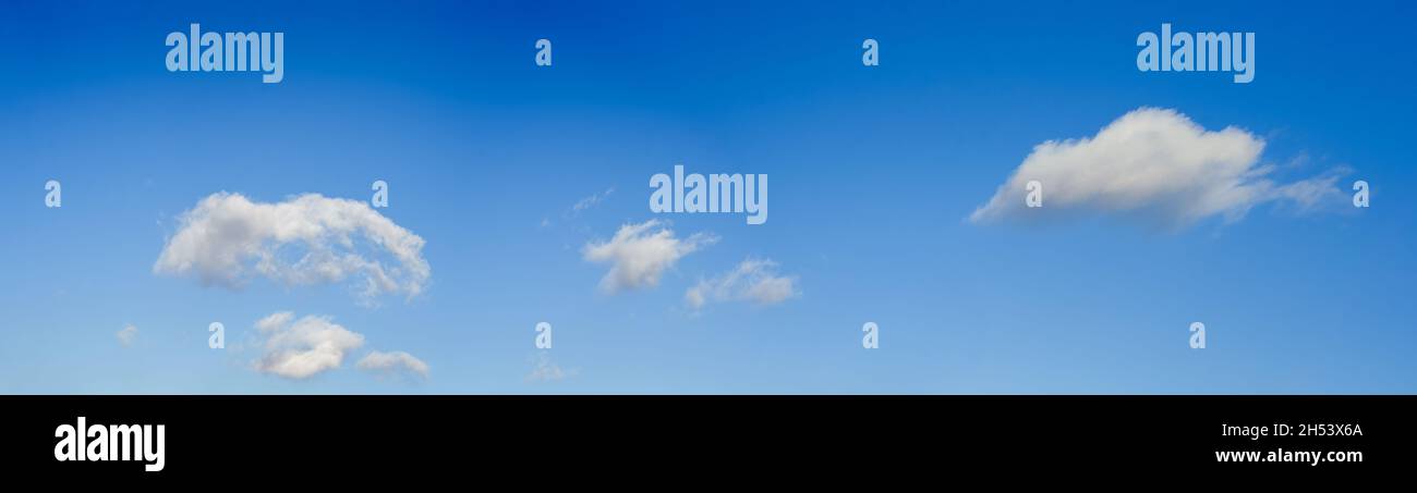 Blue sky background with tiny clouds. Panorama Stock Photo - Alamy