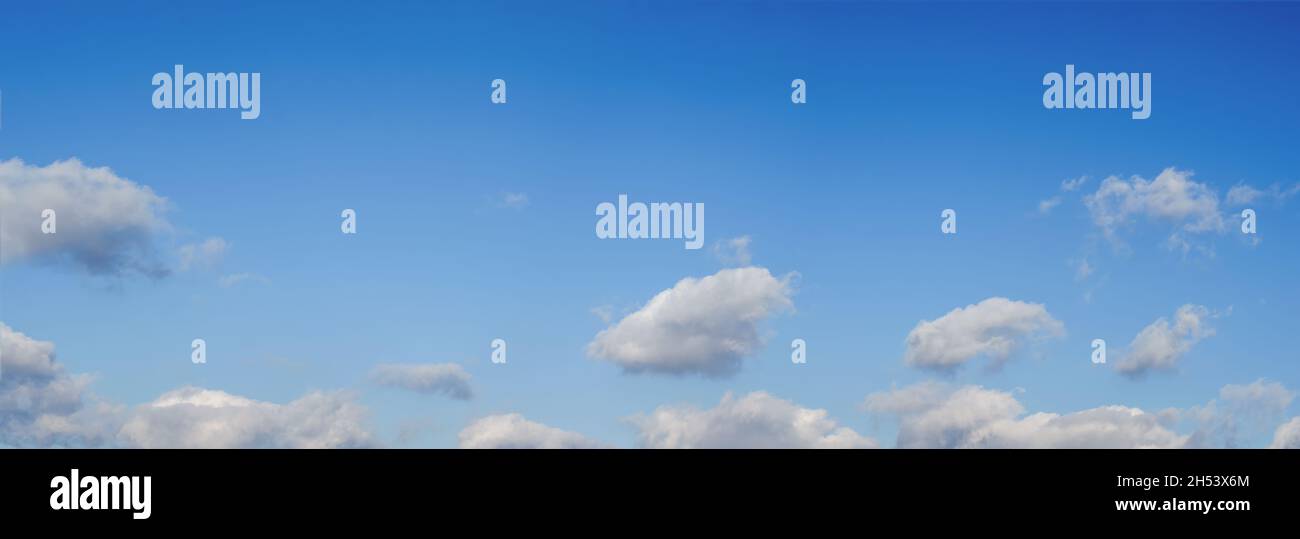 Blue sky background with tiny clouds. Panorama Stock Photo - Alamy