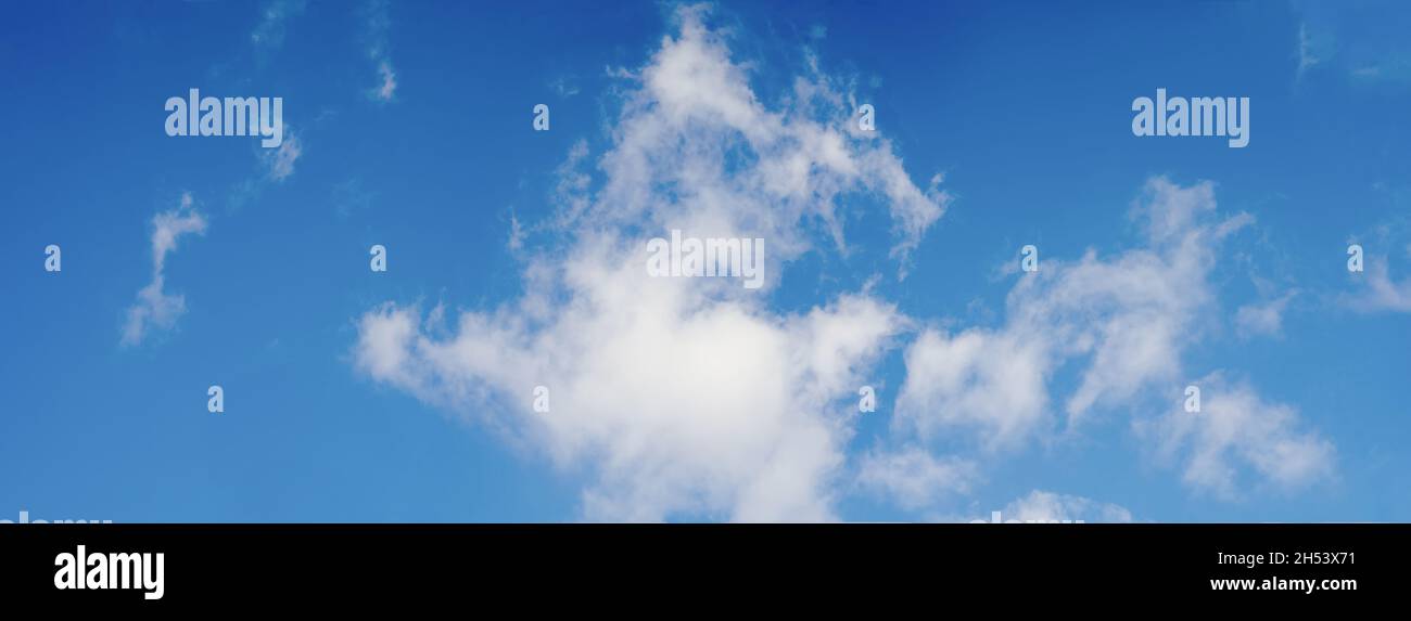 Blue sky background with tiny clouds. Panorama Stock Photo - Alamy
