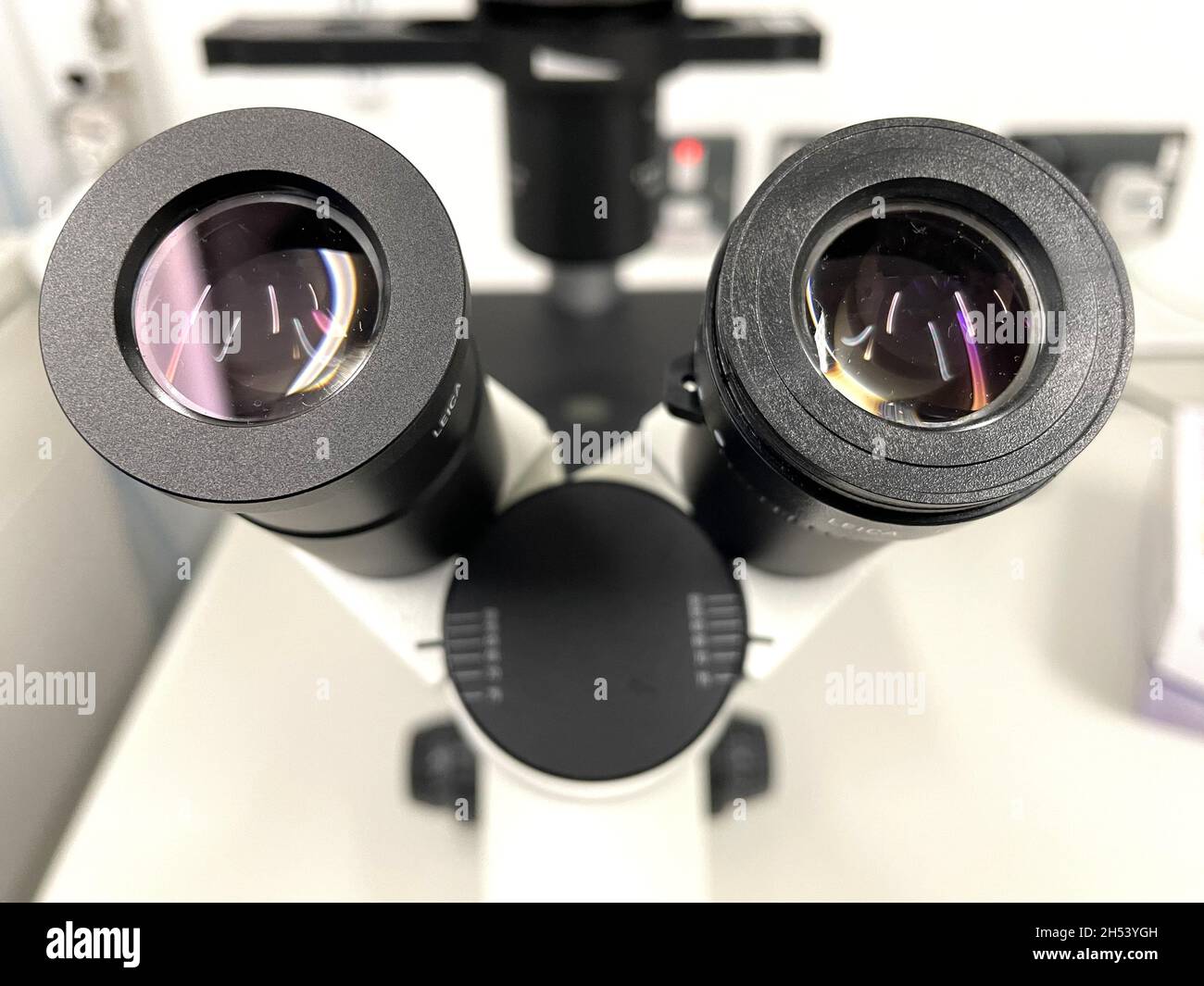Closeup shot of the ocular lens or the eyepieces of a microscope in