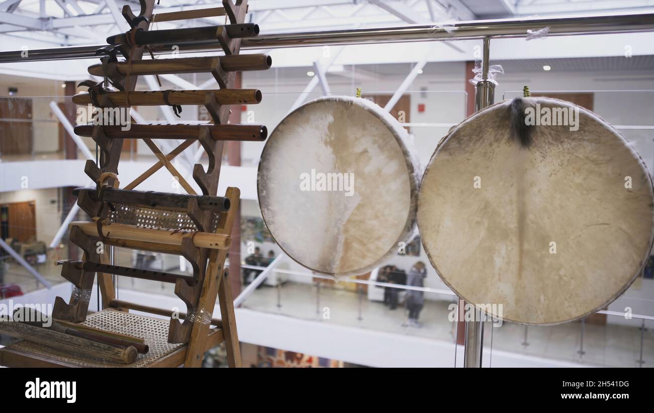 Ancient traditional gongs and tools for hunting presented at the