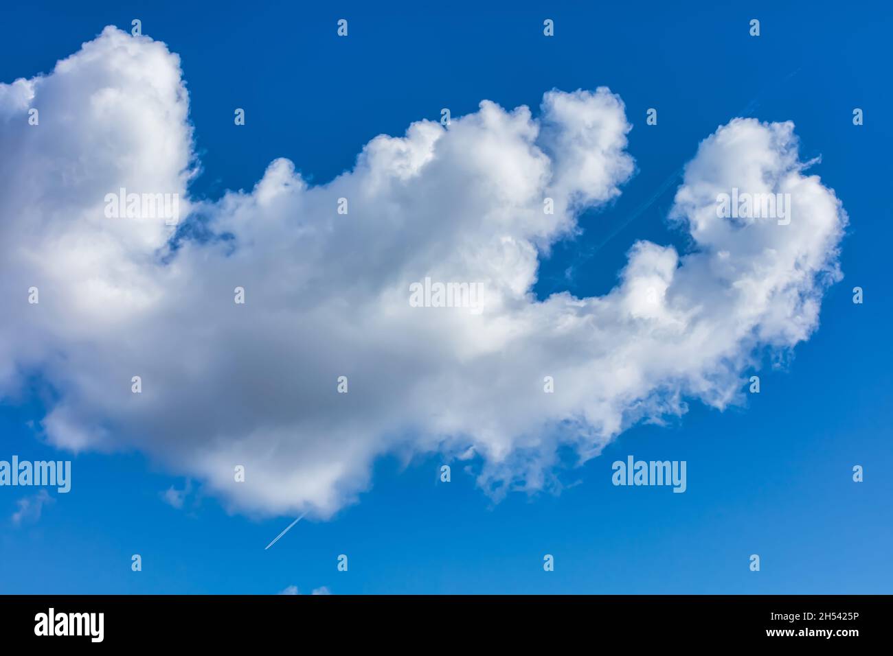 blue sky with lush cumulus clouds Stock Photo