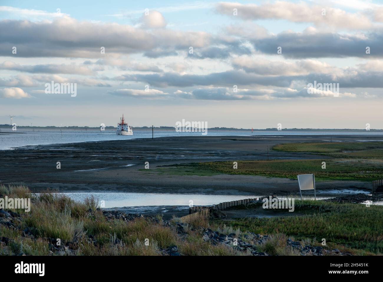Blue sky with clouds over beach hi-res stock photography and images - Alamy