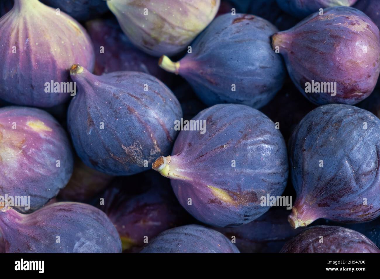 fresh jucy figs background berries at market Stock Photo