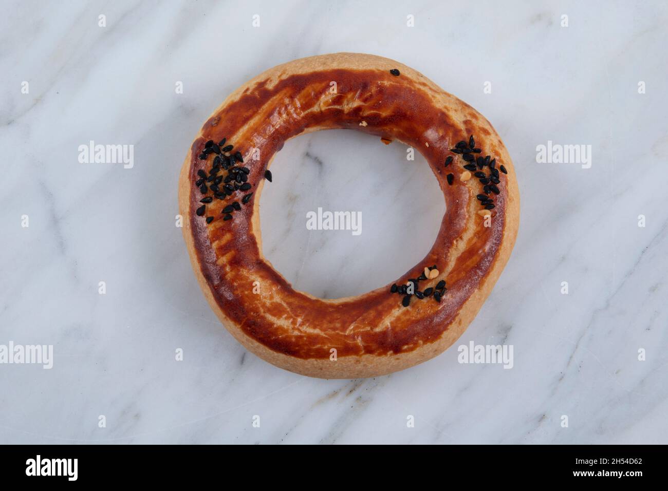 Turkish Bagel Kandil simiti with tea (stack of pastry). A savory, ring ...
