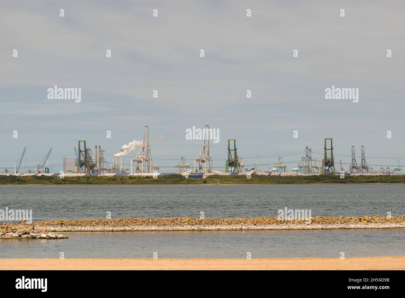 View on 'Het Oostvoornse Meer' at the Maasvlakte near Rotterdam, the Netherlands, with heavy industry in the background Stock Photo