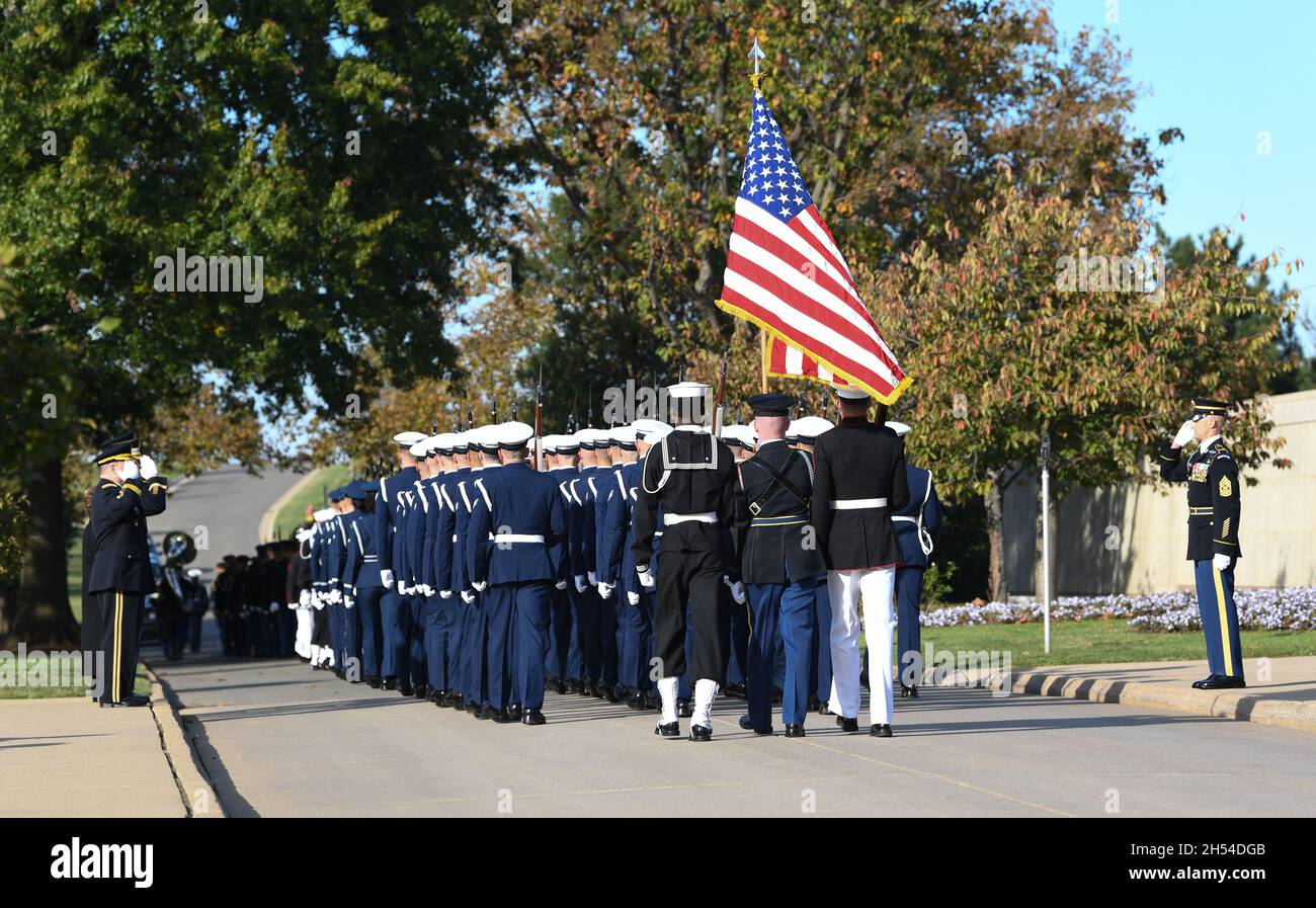 Arlington, United States. 05th Nov, 2021. U.S. Armed Forces Honor Guard, the 3d Army Infantry Regiment, Army Band and Old Guard Caisson Platoon march in a funeral procession behind the flag draped casket of former U.S. Secretary of State Gen. Colin Powell during the full honors funeral at Arlington National Cemetery, November 5, 2021 in Arlington, Virginia. Credit: Joseph Lawson/DOD Photo/Alamy Live News Stock Photo