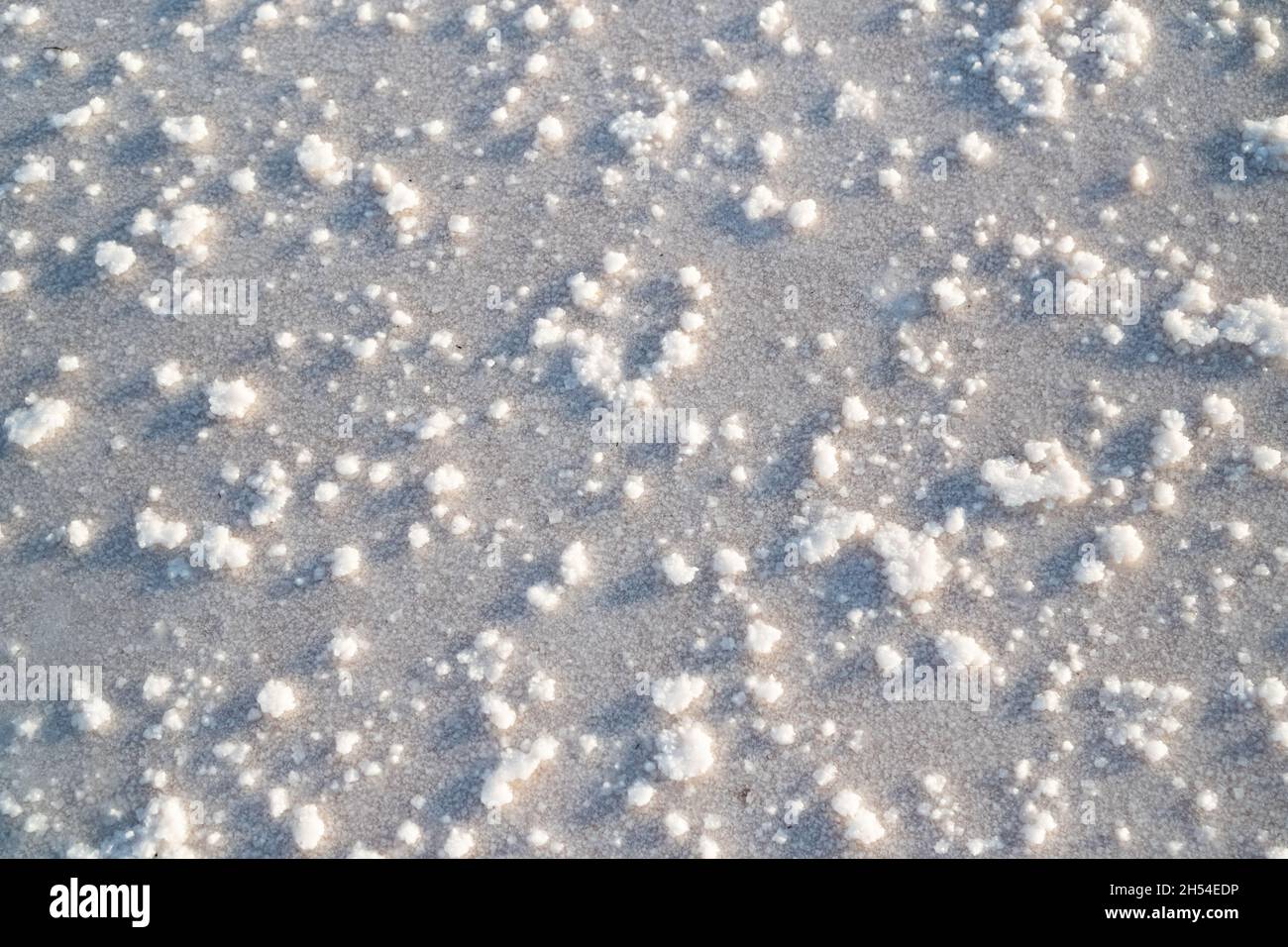incredible natural pattern from crystals of salt ground. Sunset light ...