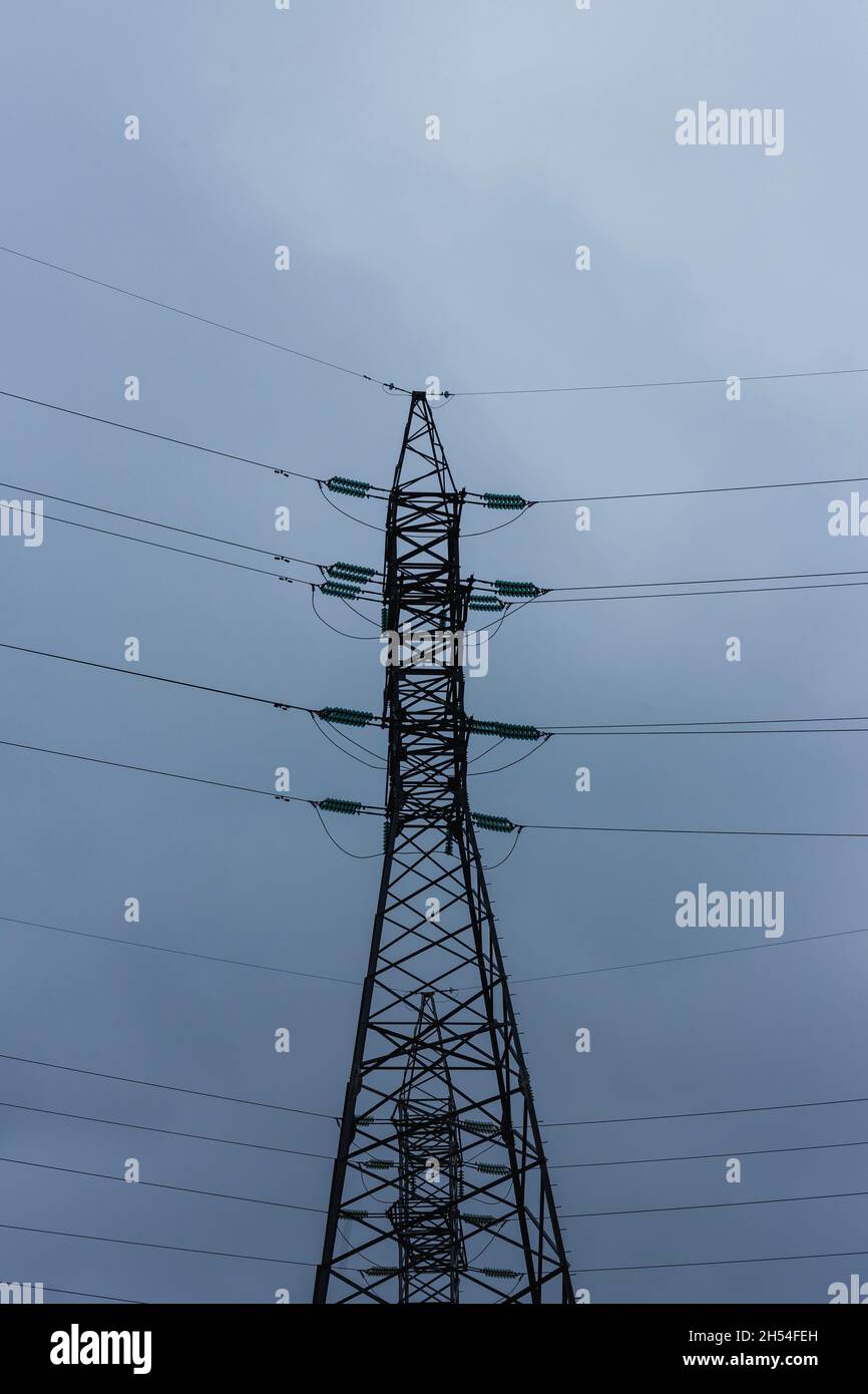 Power lines on the background of the cloudy sky Stock Photo - Alamy