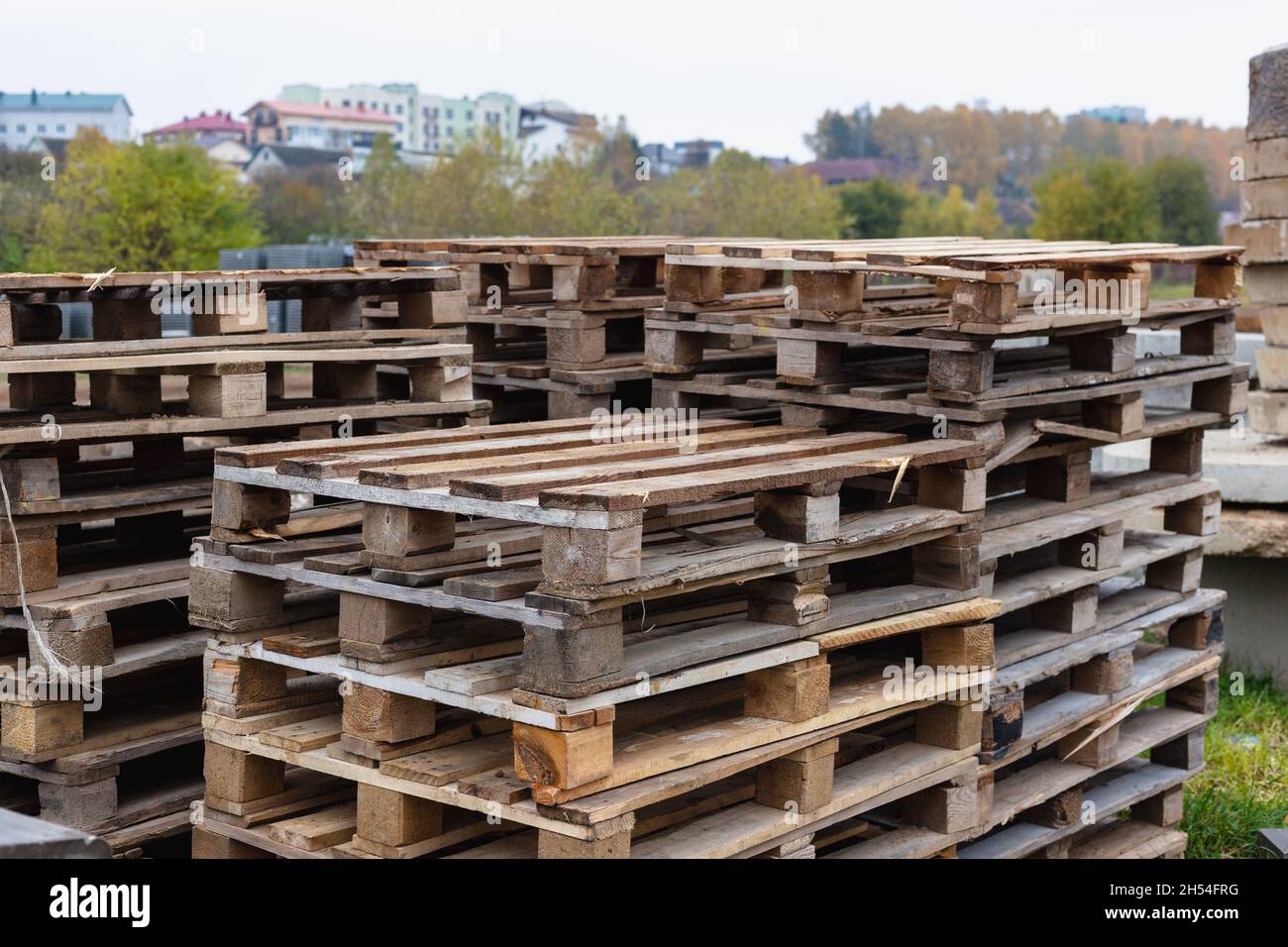 Wooden pallets for transporting building materials on a construction site Stock Photo