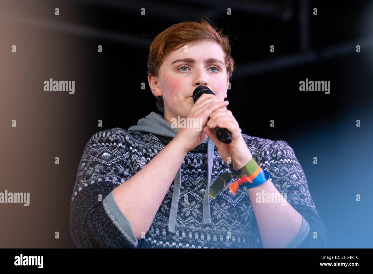 Dylan Hamilton Climate and Trans Rights Activist speaking on stage at the Fridays for Future Scotland march and protest during COP26 in Glasgow Stock Photo