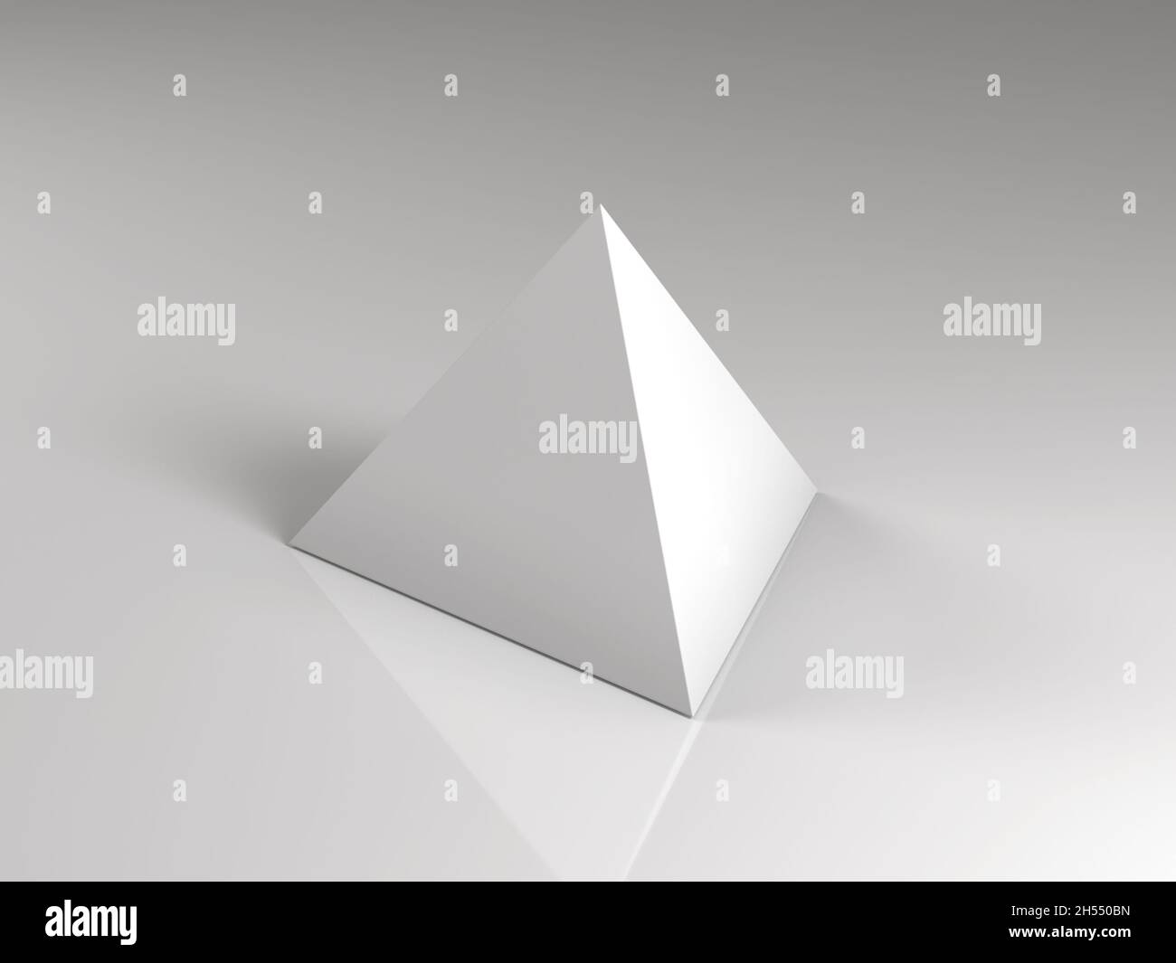 3d rendering of a white triangle-base pyramid on white reflective background Stock Photo