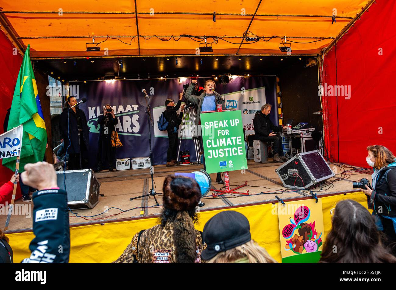 A protester seen making an emotional speech against climate change during the demonstration.The march is organized by the Dutch Climate Crisis Coalition, which is collaboration between eleven different organizations and groups. This demonstration is taking place at the same time that the UN Climate Change Conference in Glasgow, to make a call for a drastic change and to demand that the Dutch government take action now, in the shape of ambitious and fair climate policies. This was the biggest climate demonstration in the country. (Photo by Ana Fernandez/SOPA Images/Sipa USA) Stock Photo