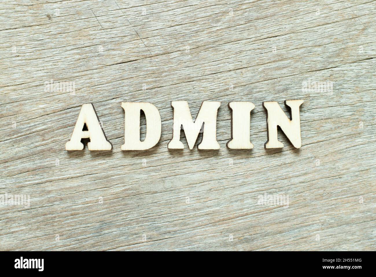 Alphabet letter in word admin on wood background Stock Photo