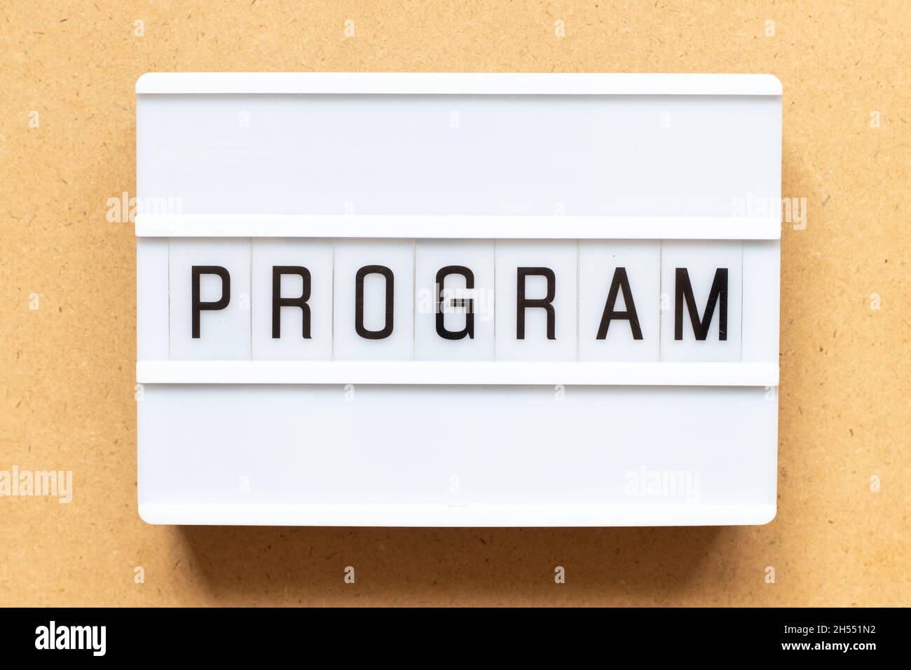 Lightbox with word program on wood background Stock Photo