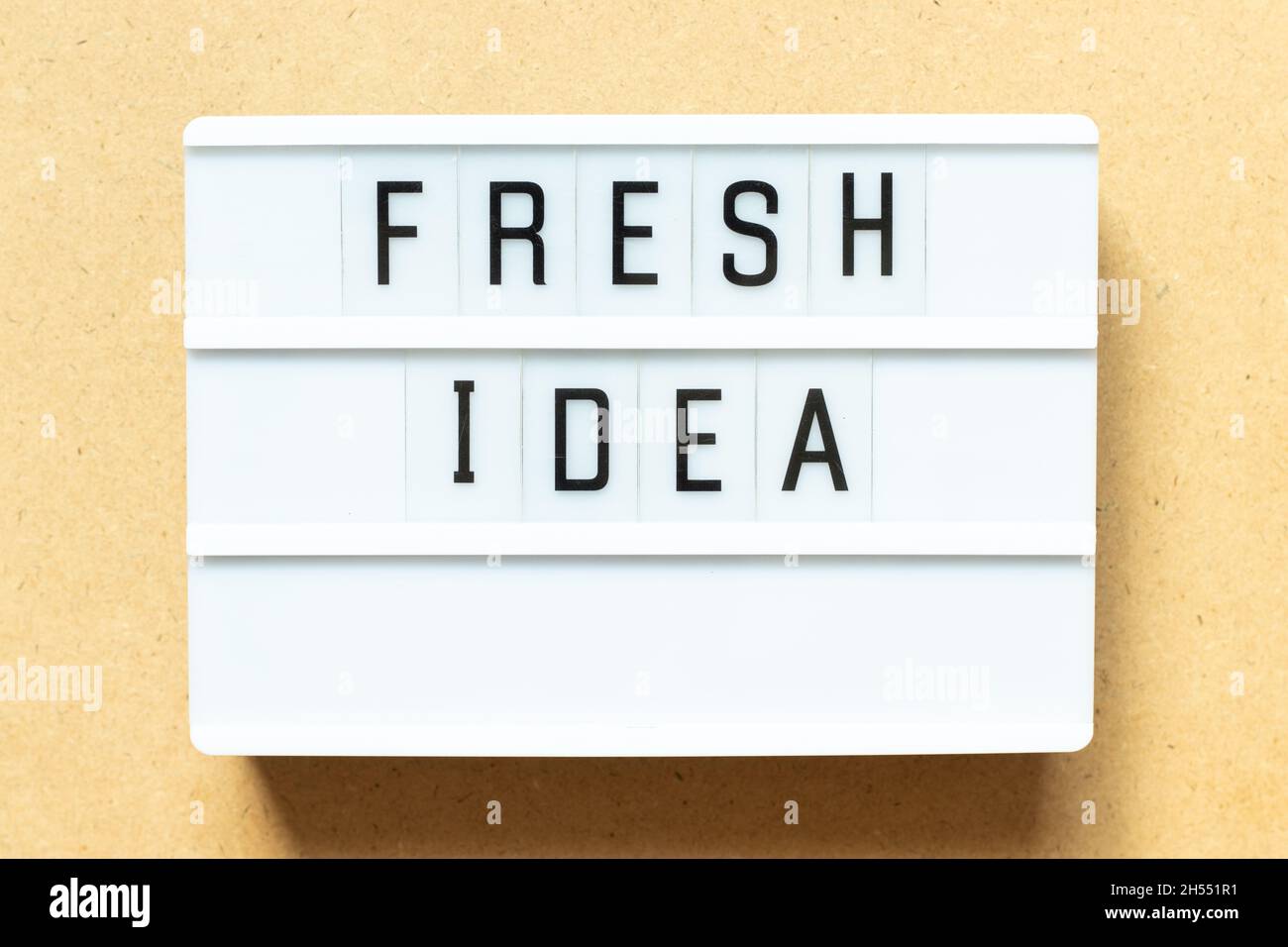 Lightbox with word fresh idea on wood background Stock Photo