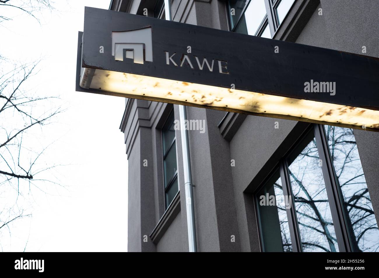 Kawe company logo on their office building. Kawe is dealing with commercial real estate management and development. Stock Photo