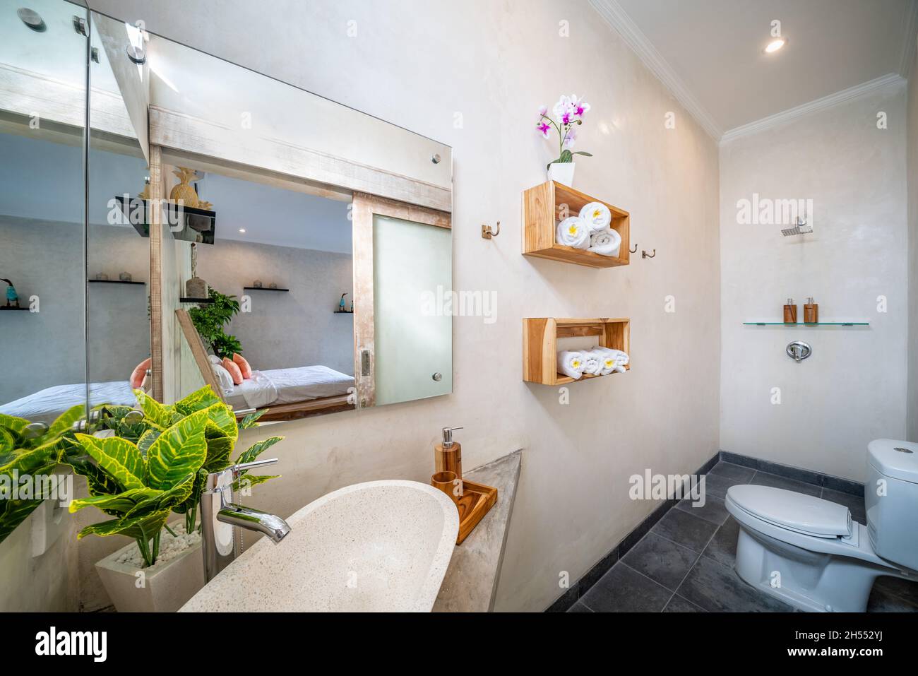 Stylish interior of modern bathroom with toilet bowl Stock Photo - Alamy