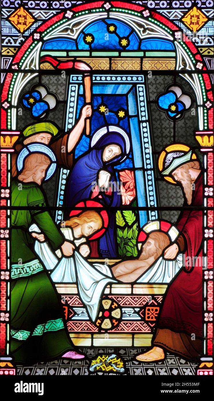 Joseph of Arimathea, Nicodemus, lay body of Jesus in Tomb, Old Hunstanton, detail of stained glass window by Frederick Preedy, 1867, Norfolk Stock Photo